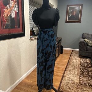 ROMPER Black Puff Sleeve Top with Blue Floral wide pants